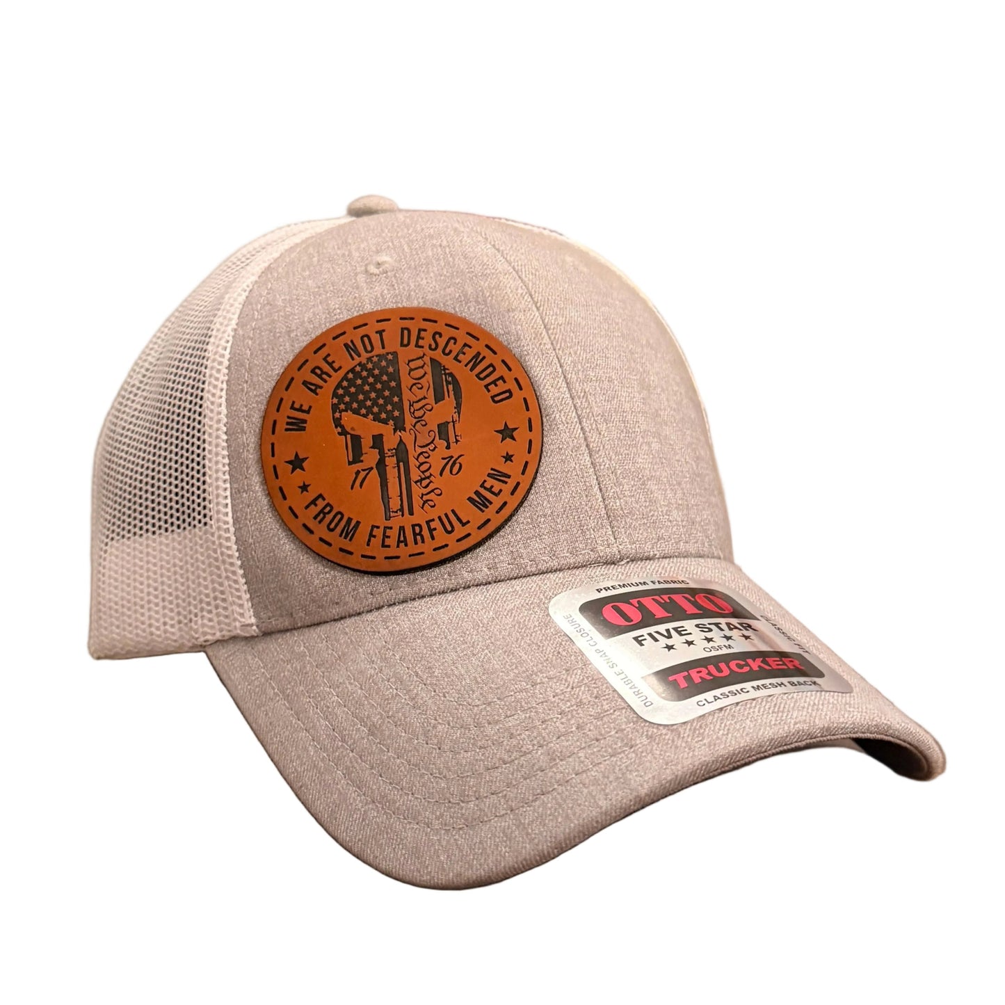 A light gray trucker hat with a brown circular patch on the front and a white size sticker on the brim